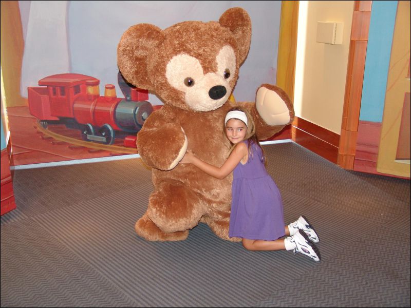 [Disney Bear getting a big hug.jpg]